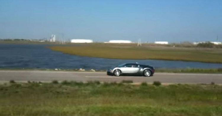 Bugatti Veyron driving near lake