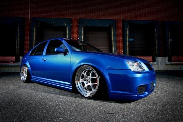 Hellaflush Stretched tires low offset wide wheels are parts of the 