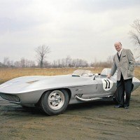 Bill Mitchell poses with his 1959 Stingray, a car originally built for racing but which Mitchell later used for his daily commute to the GM Design offices.