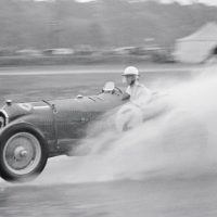 JCC International Trophy Brooklands May 6, 1939 Evans finished 3rd in the International Trophy with his ex-Nuvolari Alfa Romeo P3. It rained heavily during the race, and here Evans motorboats in the sort of conditions that today would induce mass panic in officialdom.