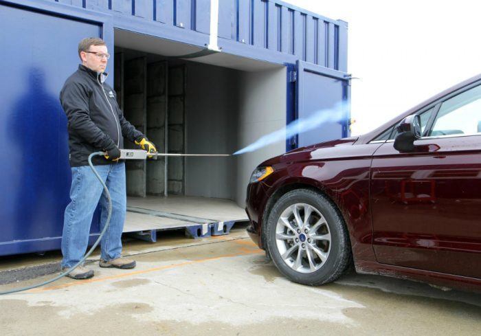 A Ford engineer at work with the mobile wind tunnel. Photo: Ford Motor Company