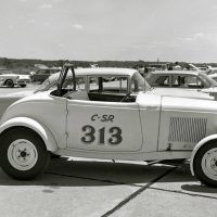 This is what a typical Southern California ’32 Ford hot rod looked like back in the day. This one was photographed in 1962 at fifth-mile drags in Virginia Beach, Virginia, running 79.53 miles per hour in the 14s. Owned by Joe Montgomery, its power came from a 100-horsepower, 292-inch flathead with a single carb. Photo by Martyn L. Schorr.