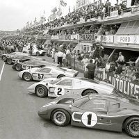 The Ford pits prior to the start of the 1967 24 Hours of Le Mans. Dan Gurney and A. J. Foyt drove the Mark IV J-6 in the foreground to the win. It was the first time an all- American car had won at Le Mans. Ford Motor Company