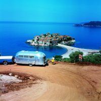 People who travel via Airstream get to see more of the world than folks who fly or take the train. Here we see one traveler looking at beautiful Sveti Stefan, an island connected by causeway to the mainland in Montenegro about four miles southeast of Budva.
