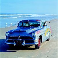 This 1954 Hudson Hornet equipped with full Hudson NASCAR racing kit—Twin-H engine and heavyduty suspension and brakes—was discovered in North Carolina near the home of NASCAR legend Herb Thomas and is thought to have been a backup car for Thomas’ fabled No. 92 Fabulous Hudson Hornet.