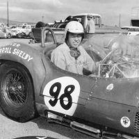 Carroll Shelby, the racer, is shown here in the Birdcage Maserati he so skillfully piloted, sans signature bib overalls. Shelby looks right at home. Note the race no. 98, which would later become Ken Miles’ number of choice, and the Autolite sponsorship—odd, for an Italian sports racing car! Courtesy of Shelby American, Inc.