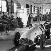 At the time of Chinetti’s Le Mans victory, Ferrari was a small constructor focused primarily on racecar production. This is the competition department in September 1950; in the foreground is a 125 C, while over to the left the first 375 F1 is under construction. The latter’s powerplant would play a major role in Ferrari’s first hypercars. The Mailander collection at the Revs Institute for Automotive Research