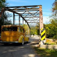 Driving the Woody east across a quaint bridge on a beautiful autumn day was one of many pleasures of the Barn Find Road Trip.