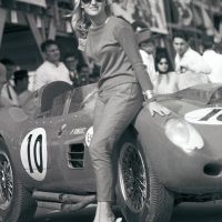 This unidentified beauty poses against Wolfgang Von Trips’s Ferrari 315S prior to the start of the 1958 Grand Prix. Perhaps she rubbed on some good luck, because Von Trips finished fourth.