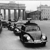 Volkswagens cruise through Berlin in 1939. Note that the cars now have fronthinged doors. Ferry incorporated the design in 1937 after returning from his trip to America, where he observed that most U.S. cars were built in this fashion. Photo: Porsche Werkfoto.