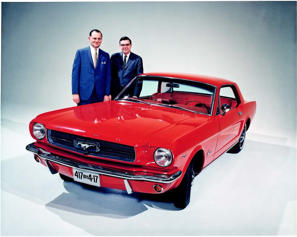 Lee Iacocca (left) and Donald Frey had high hopes for the Mustang in April 1964. As the license plate proclaims, their goal was to sell 417,000 Mustangs by April 17th, 1965, besting Detroit’s record for first-year sales of a new model. Photo: Ford Motor Company. 