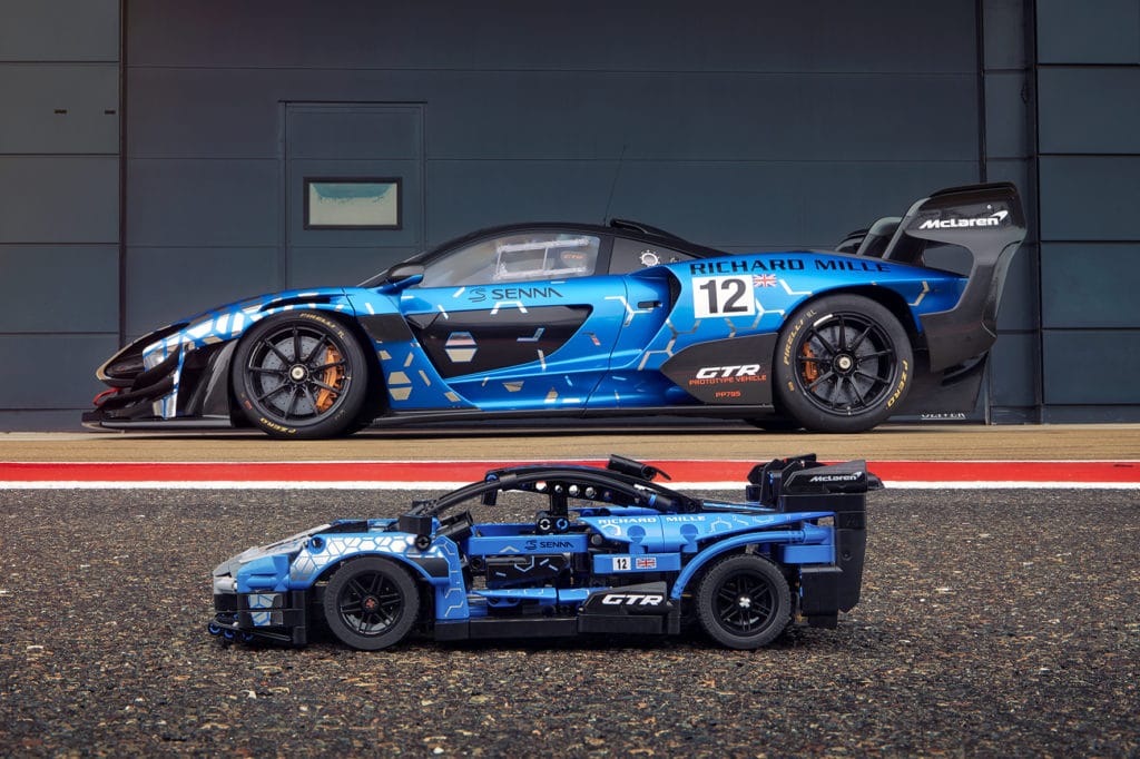 The LEGO Technic McLaren Senna GTR includes a V8 engine with moving pistons, dihedral doors that swing open, and a one-of-a-kind blue livery.