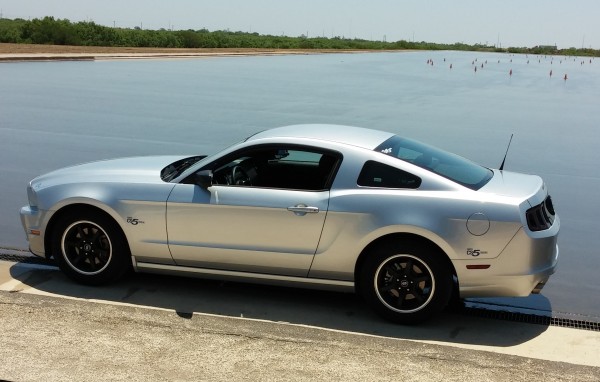 The silver Mustang with Cooper CS5 Grand Touring Tires, size 215/65R17.  A black Mustang was parked not far behind this one with Hankook H27 tires.