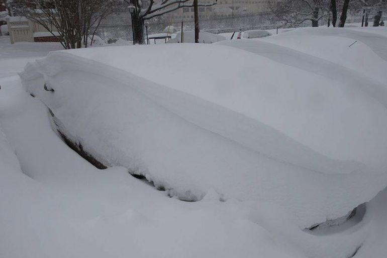 Snow Covered Car