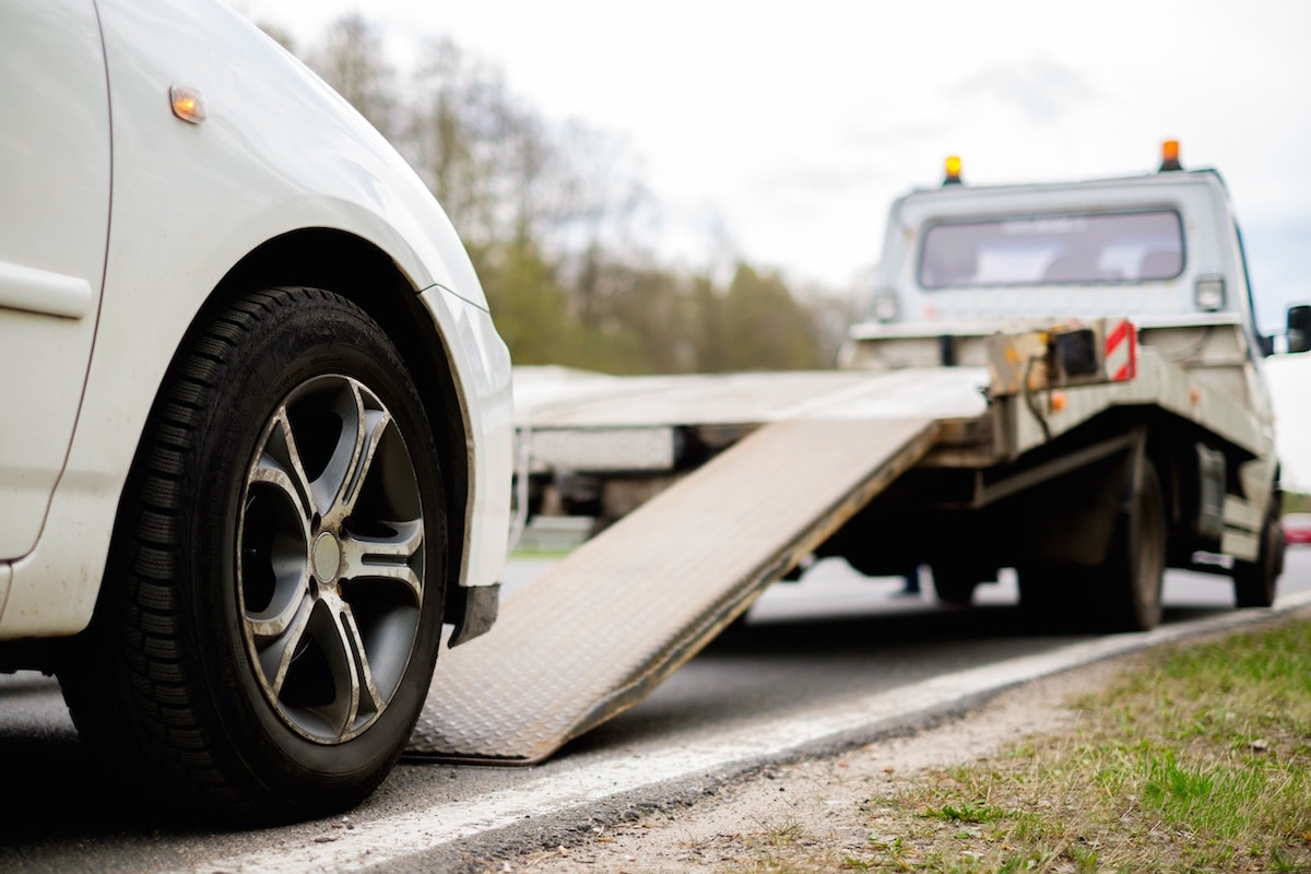 The best car insurance coverage may include roadside assistance with benefits like coverage for loading a car onto a tow truck.