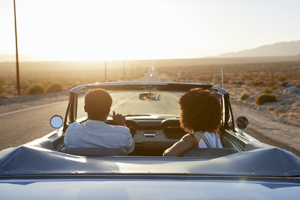 Couple driving with California car insurance