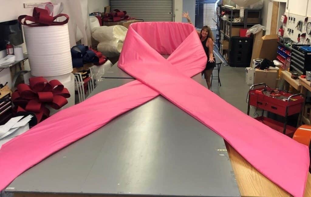 A giant pink velvet bow for breast cancer awareness