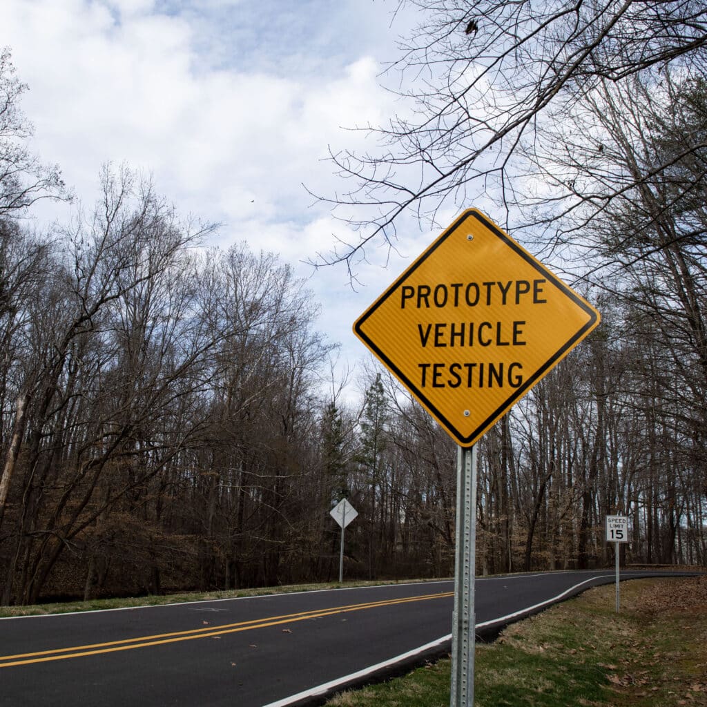 a yellow sign marks the rural nc a&t autonomous car test track at the north entrance