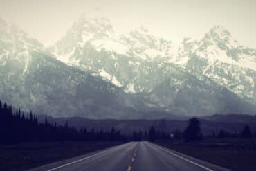a road near grand teton national park in wyoming