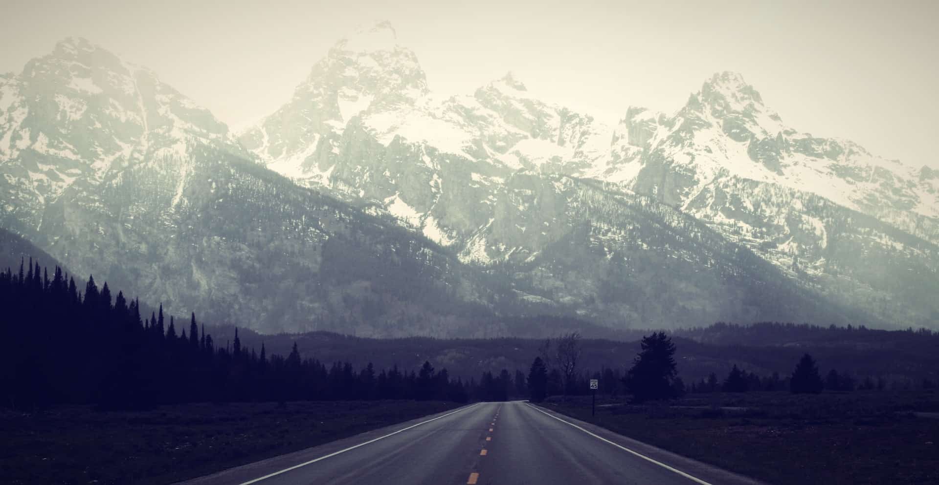 a road near grand teton national park in wyoming
