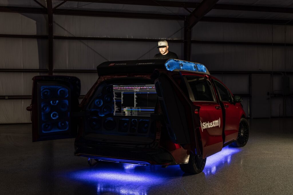 The Toyota Sienna Remix has a retractable roof panel with an elevated platform below, creating a functional and mobile DJ booth.